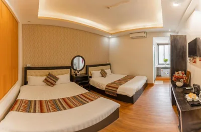 Standard Quadruple Room — Phuong Nam Hotel